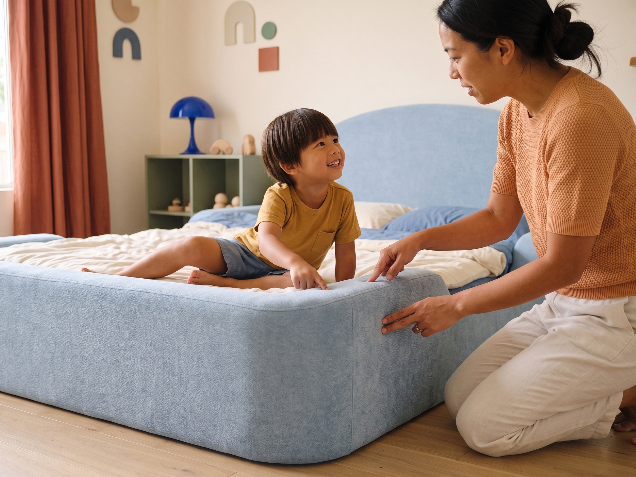 A close view of the soft rounded edge of the Little Lifely Bed.