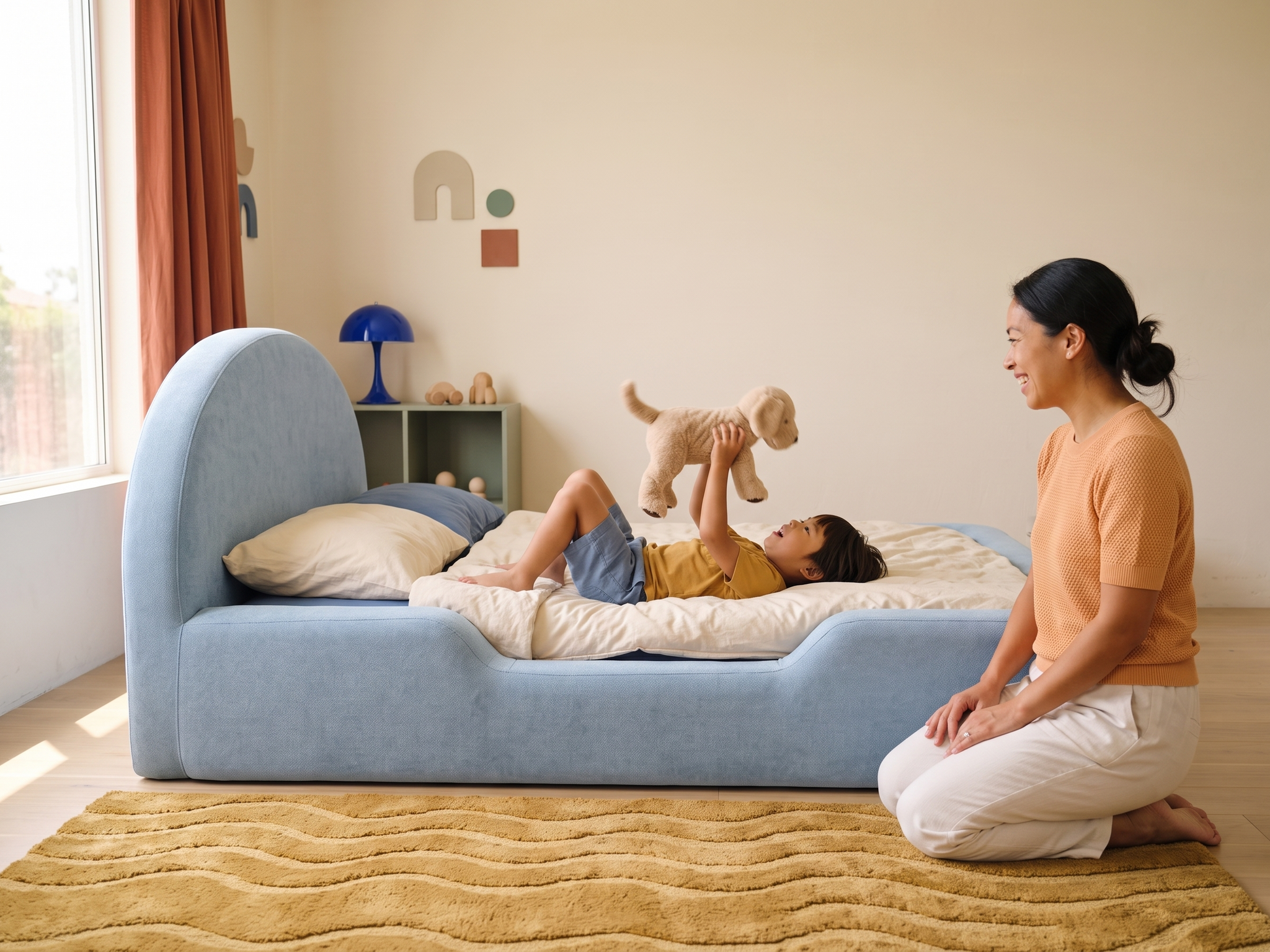 A child safely rolling against the padded side of the Little Lifely Bed.